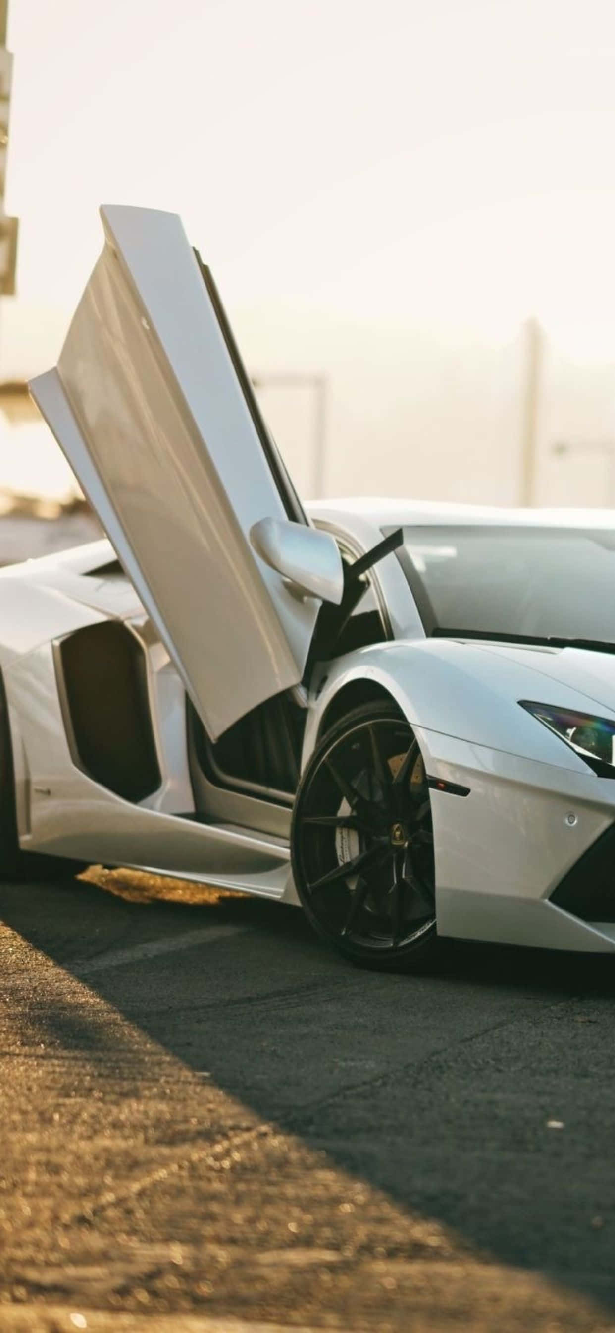 兰博基尼Aventador Roadster背景下的iPhone XS Max 壁纸