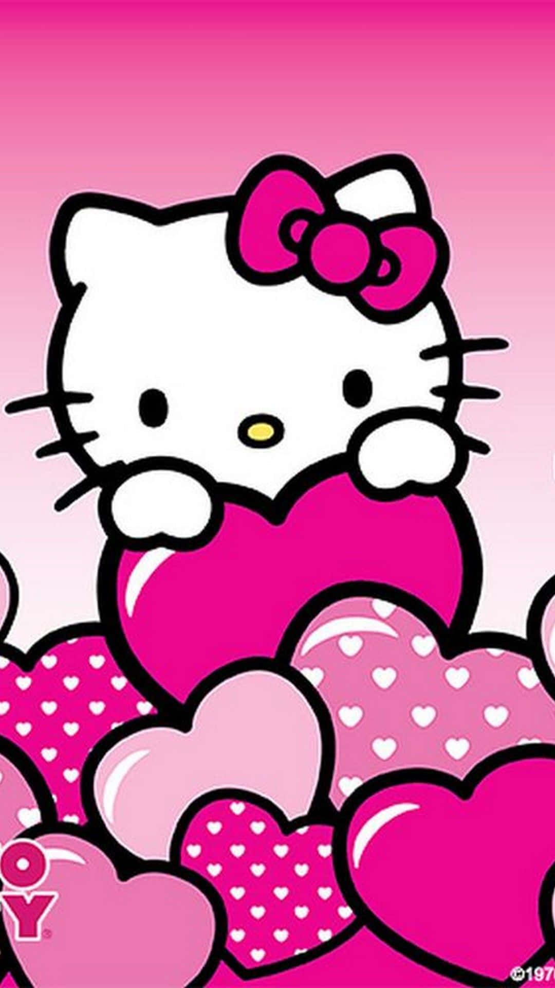 可爱粉色Hello Kitty拥抱爱心 壁纸