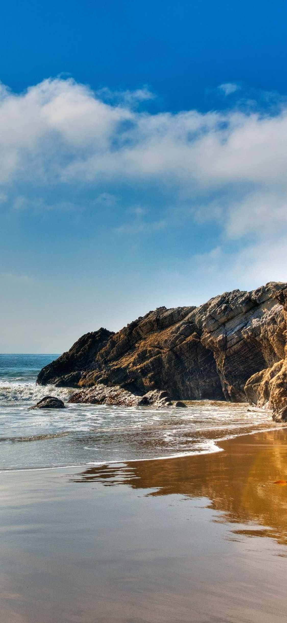 用你的iPhone Xs马利布享受美丽的海洋景色 壁纸