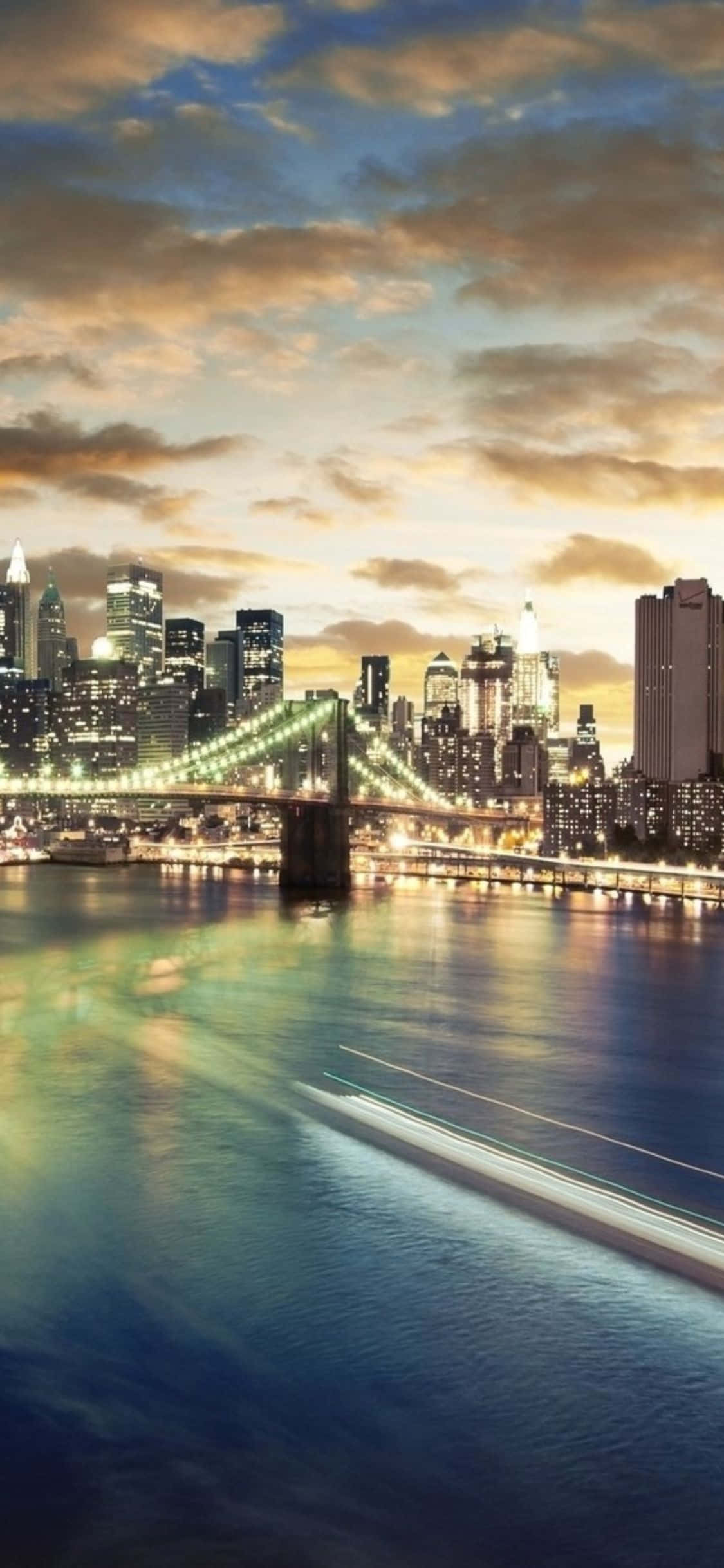 通过iPhone Xs镜头看到的纽约市夜景天际线 壁纸