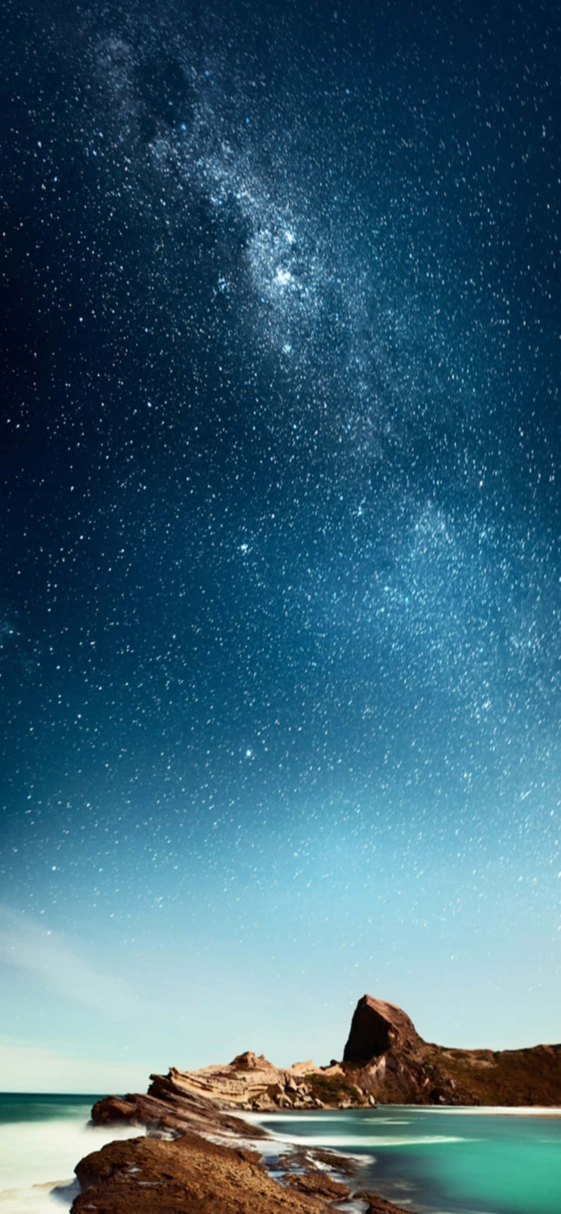 iPhone XS 沙滩与银河背景 壁纸