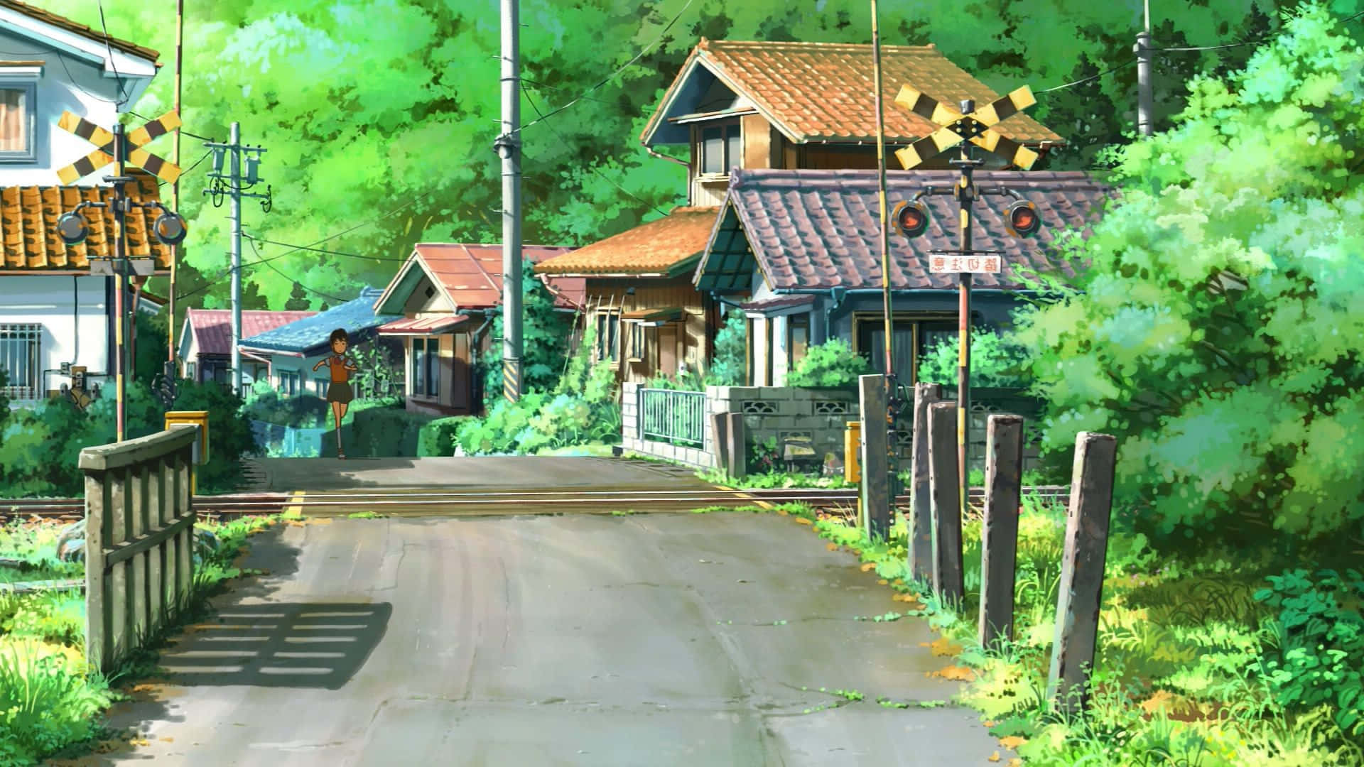 一条有房屋和火车的街道 壁纸