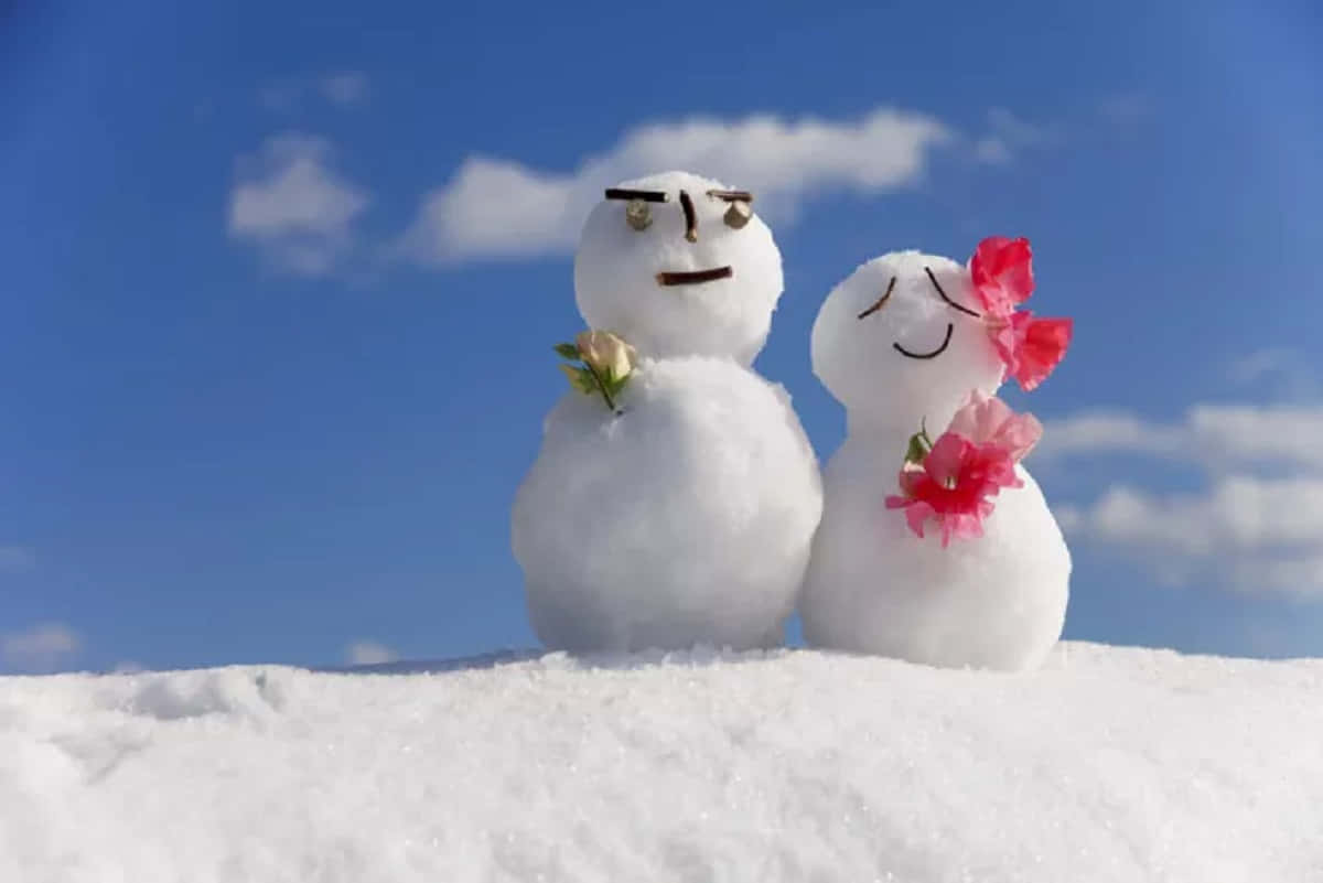 冬日仙境雪人情侣图片 壁纸