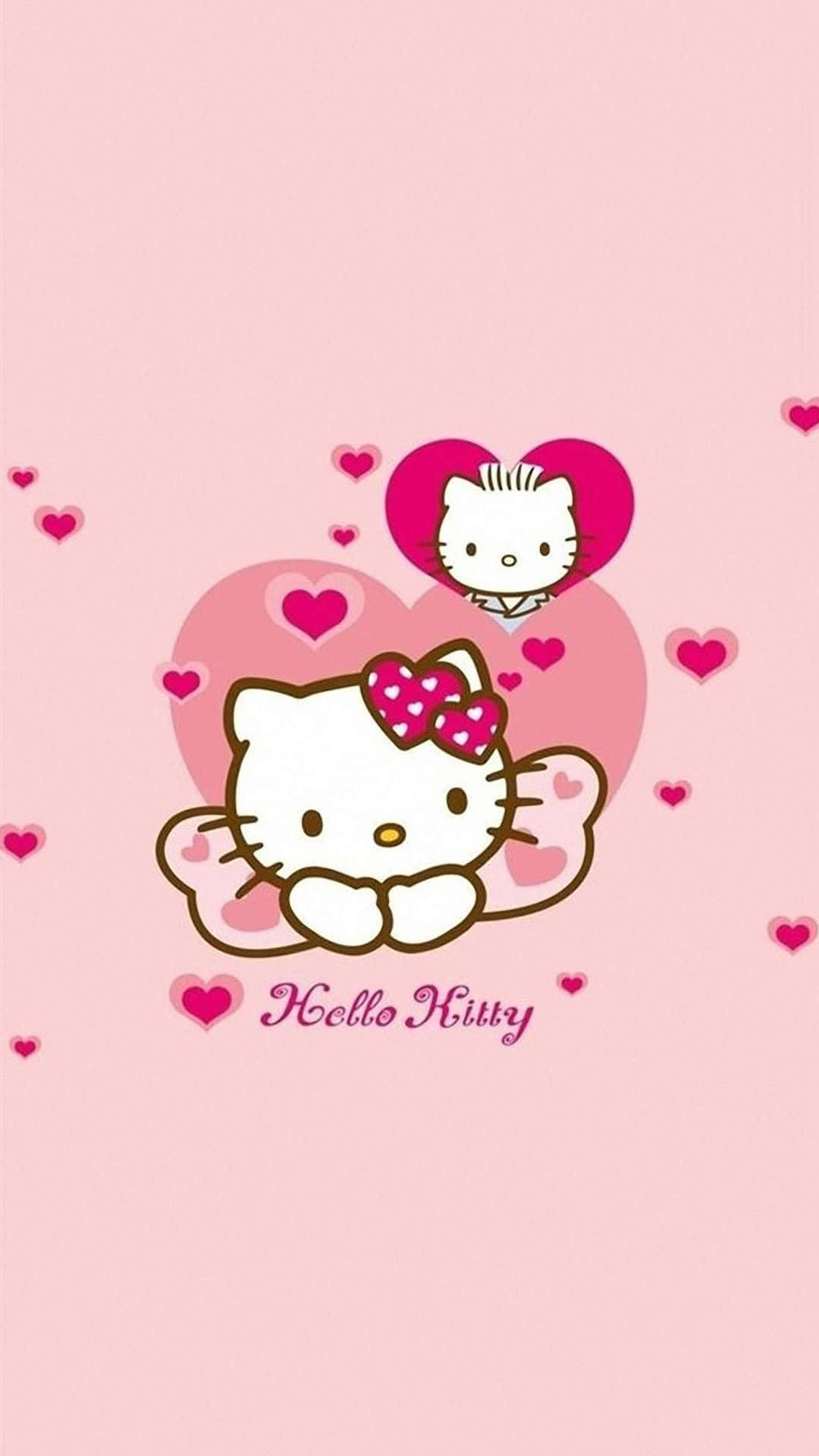 可爱粉色Hello Kitty倚靠丝带 壁纸