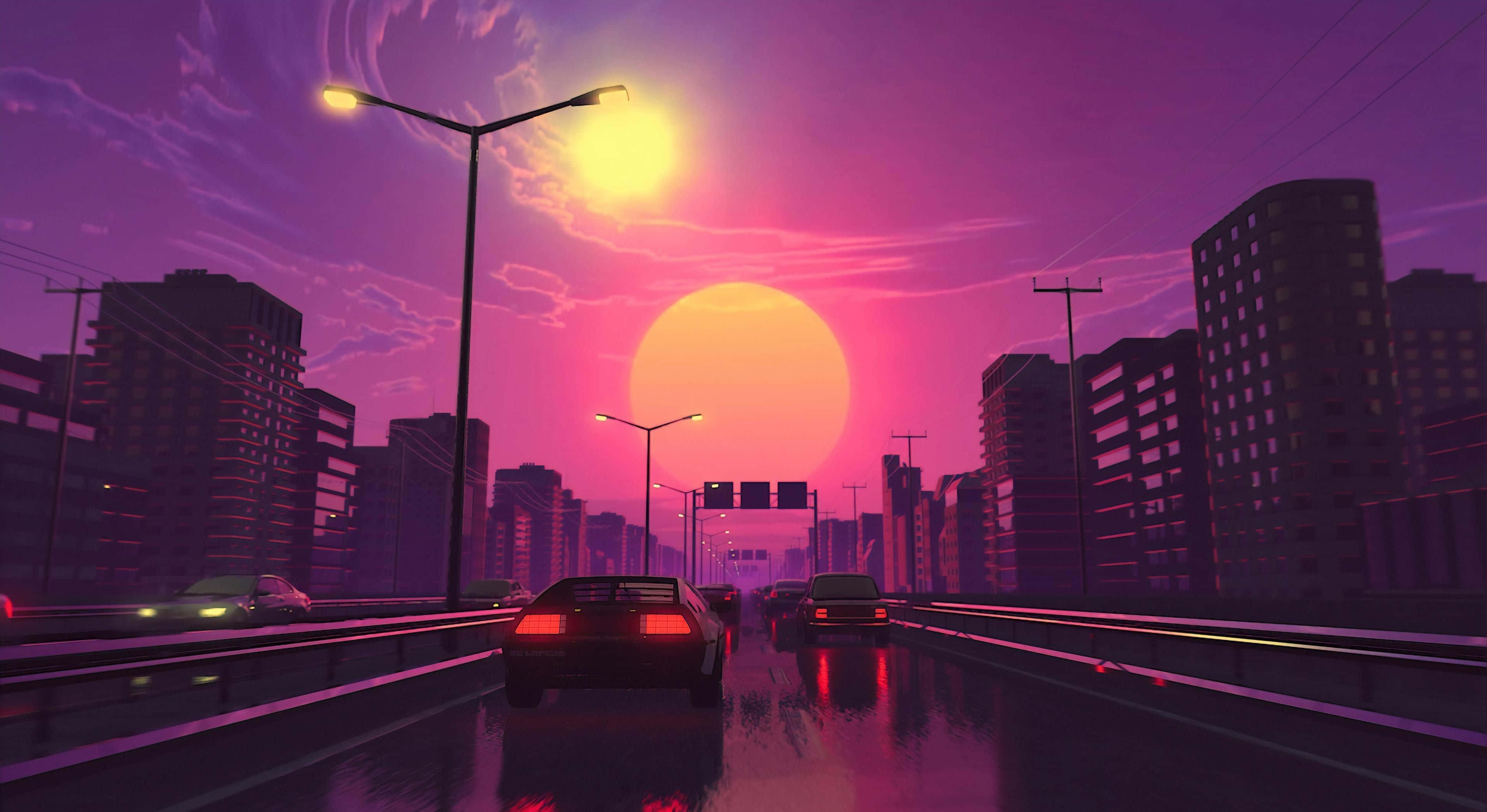 夜晚城市中汽车沿街行驶的景象 壁纸