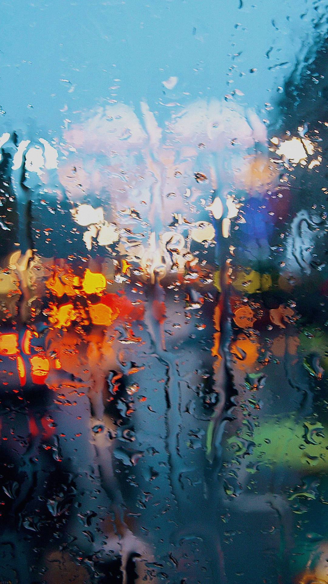 雨水滑落窗边的iPhone壁纸