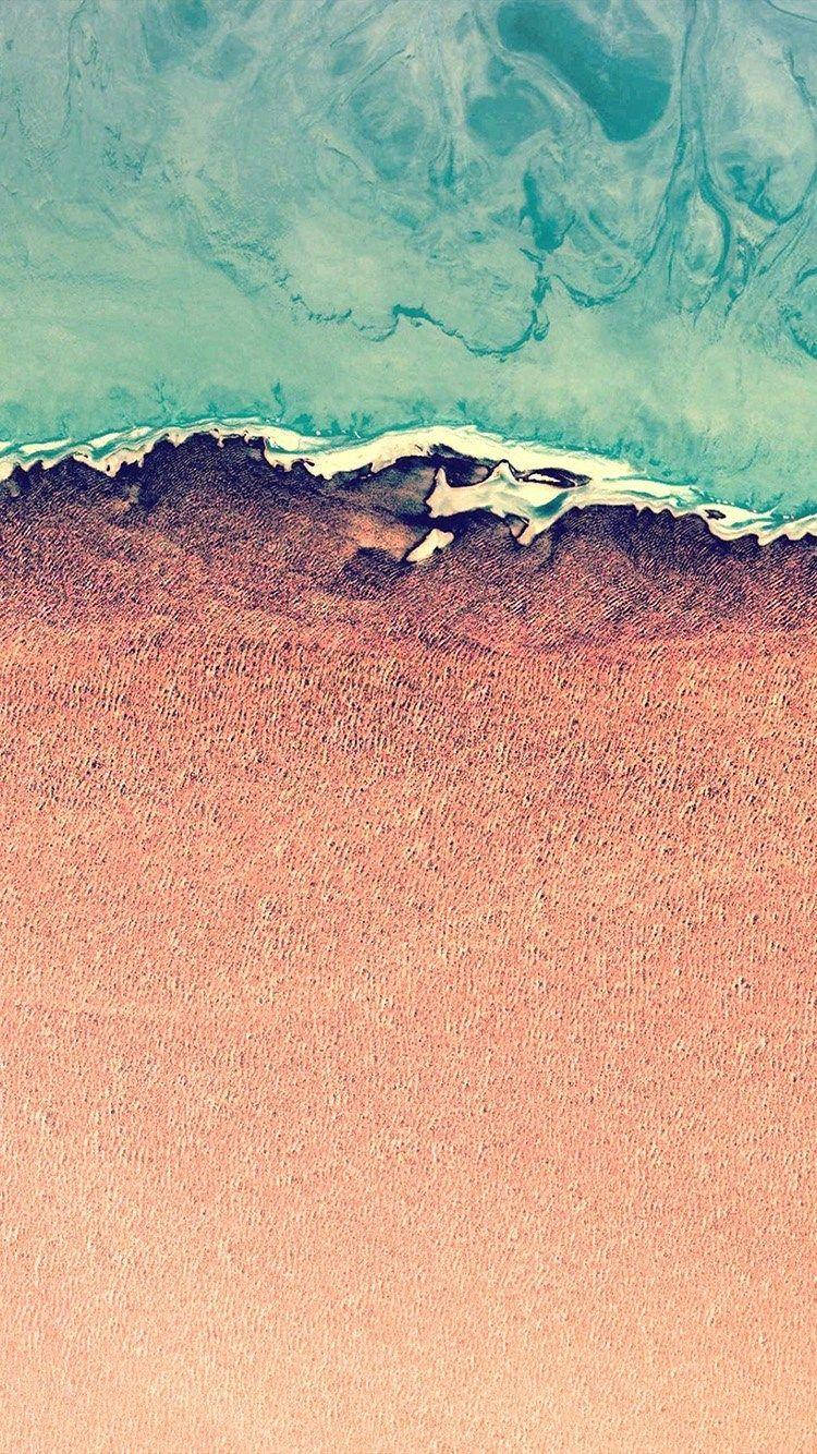 海水与橙色沙画 iOS 12 壁纸