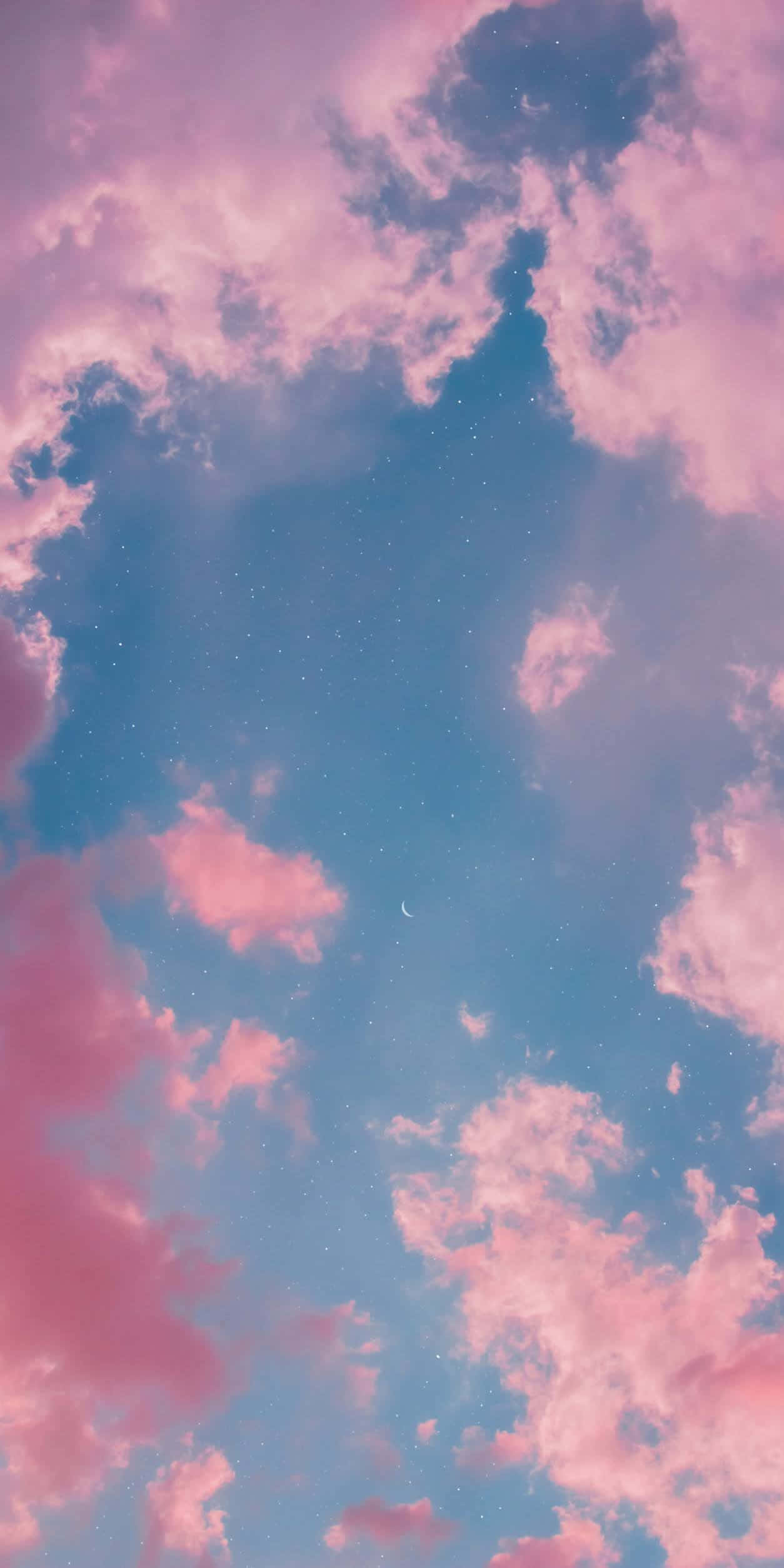 粉色天空中的云与月亮 壁纸