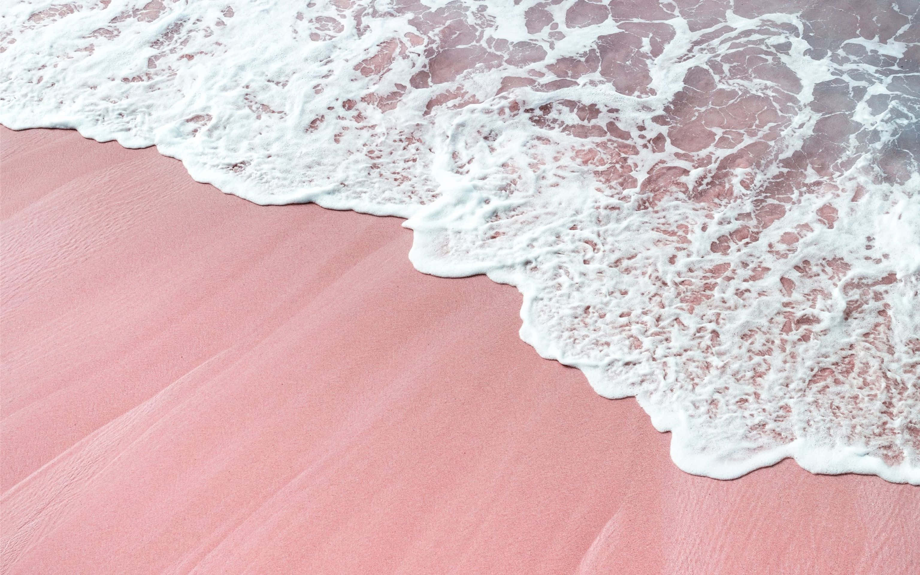 粉色沙滩与海浪 壁纸
