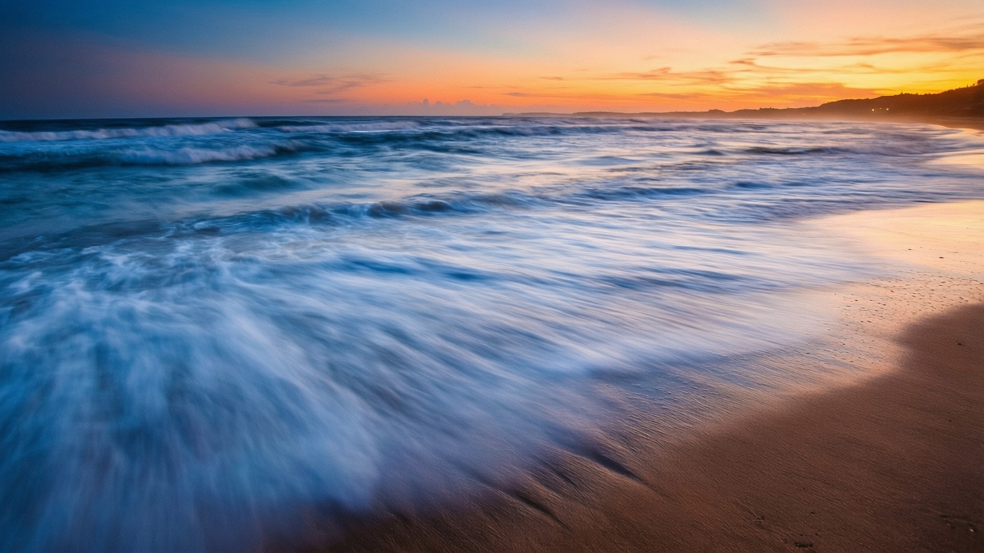 长曝光夕阳海浪 壁纸