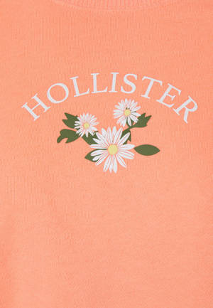 Hollister三朵白色花朵图案壁纸 — 低对比度 壁纸