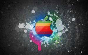 苹果Macbook标志在灰色墙壁上的酷炫彩色壁纸，带有油漆飞溅效果