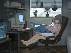 动漫女孩在笔记本电脑前睡着