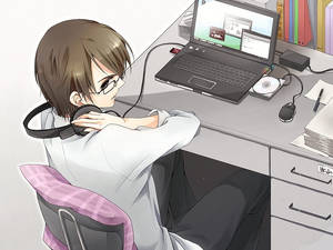 动漫少年戴着耳机在笔记本电脑前工作