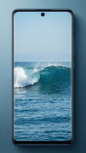 简约风格的Pixel 8屏幕壁纸，展现宁静的海洋波浪。 — Pixel 8 壁纸