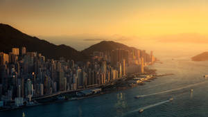 美丽的香港城市景观与日落壁纸。 — 1600x900 壁纸