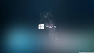 蓝色星系烟雾中白色Windows 10标志壁纸