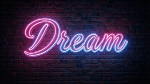 粉色与蓝色霓虹灯招牌'Dream'，置于暗砖背景，适配AMOLED屏幕
